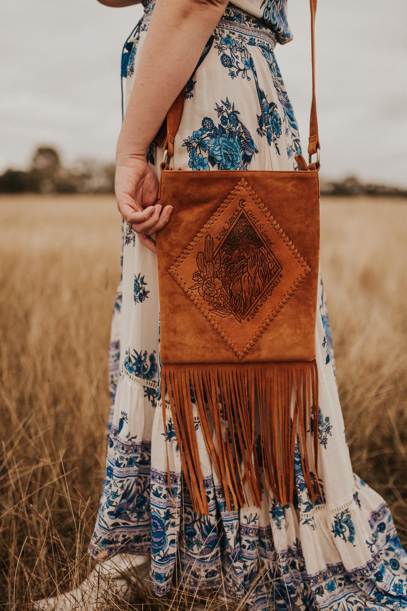 HIGH HORSE TASSEL SUED TAN BAG